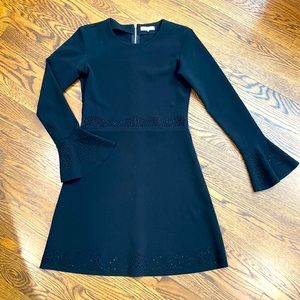 Parker Black Long Sleeve Dress with Perforated Details. Swing bottom. Size Med